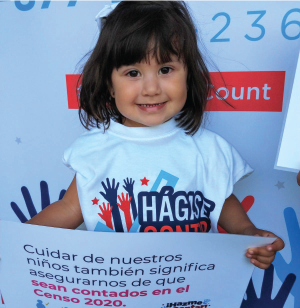 young girl holding a sign about the Census